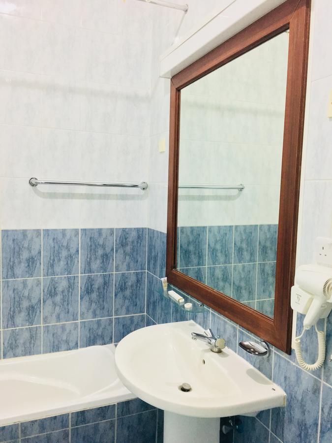 Dama Hotel Duba Cameră foto